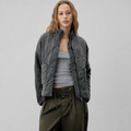 Women's quilted jacket with high collar and patch pockets